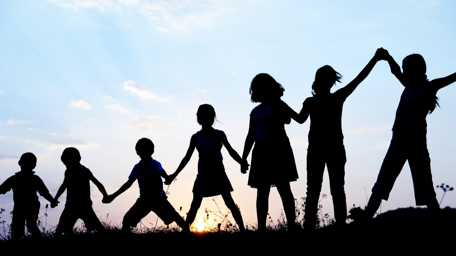 Happy children playing on hot summer night